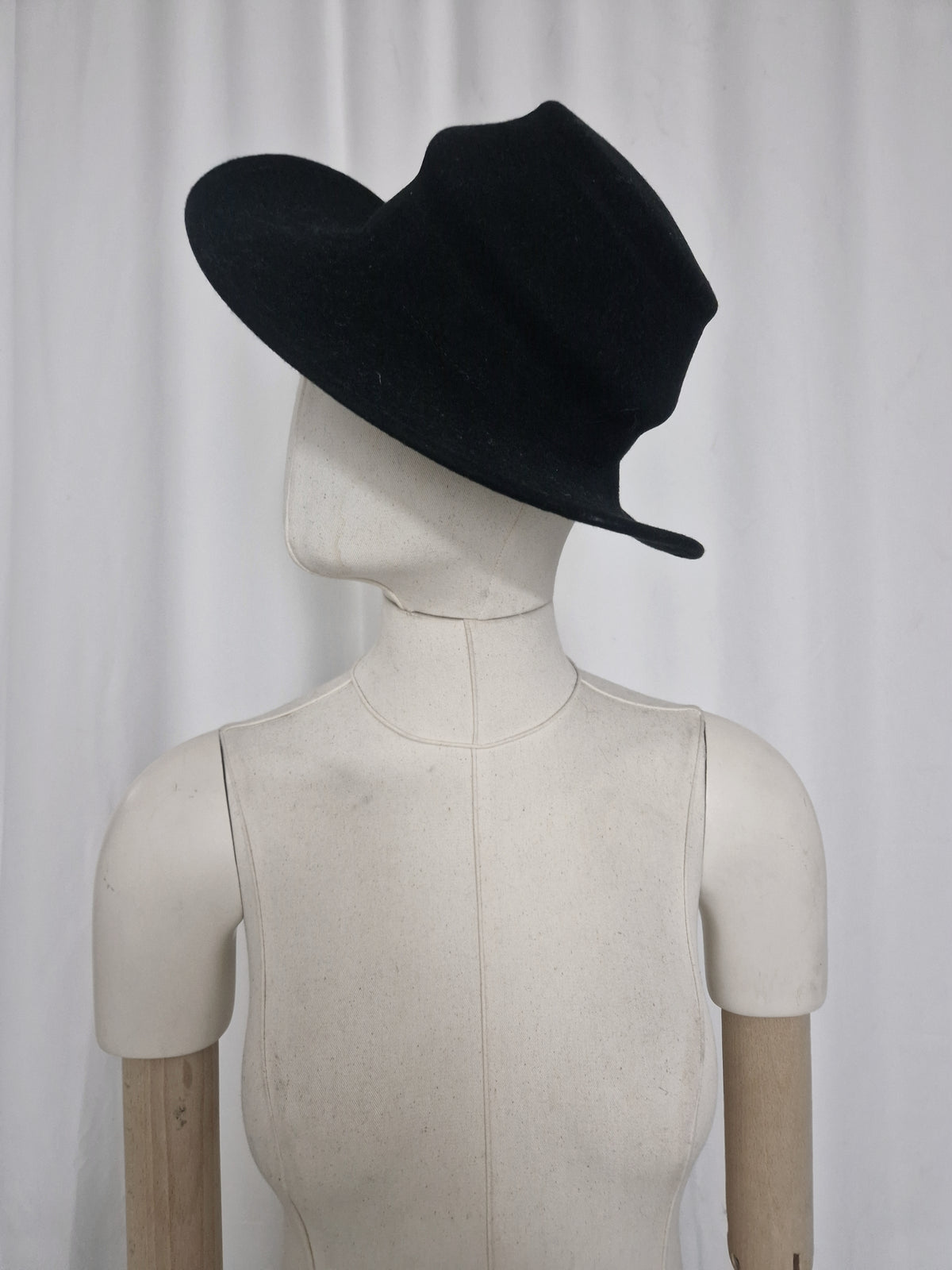 Asymmetric wool felt hat made by combining two of our hat blocks