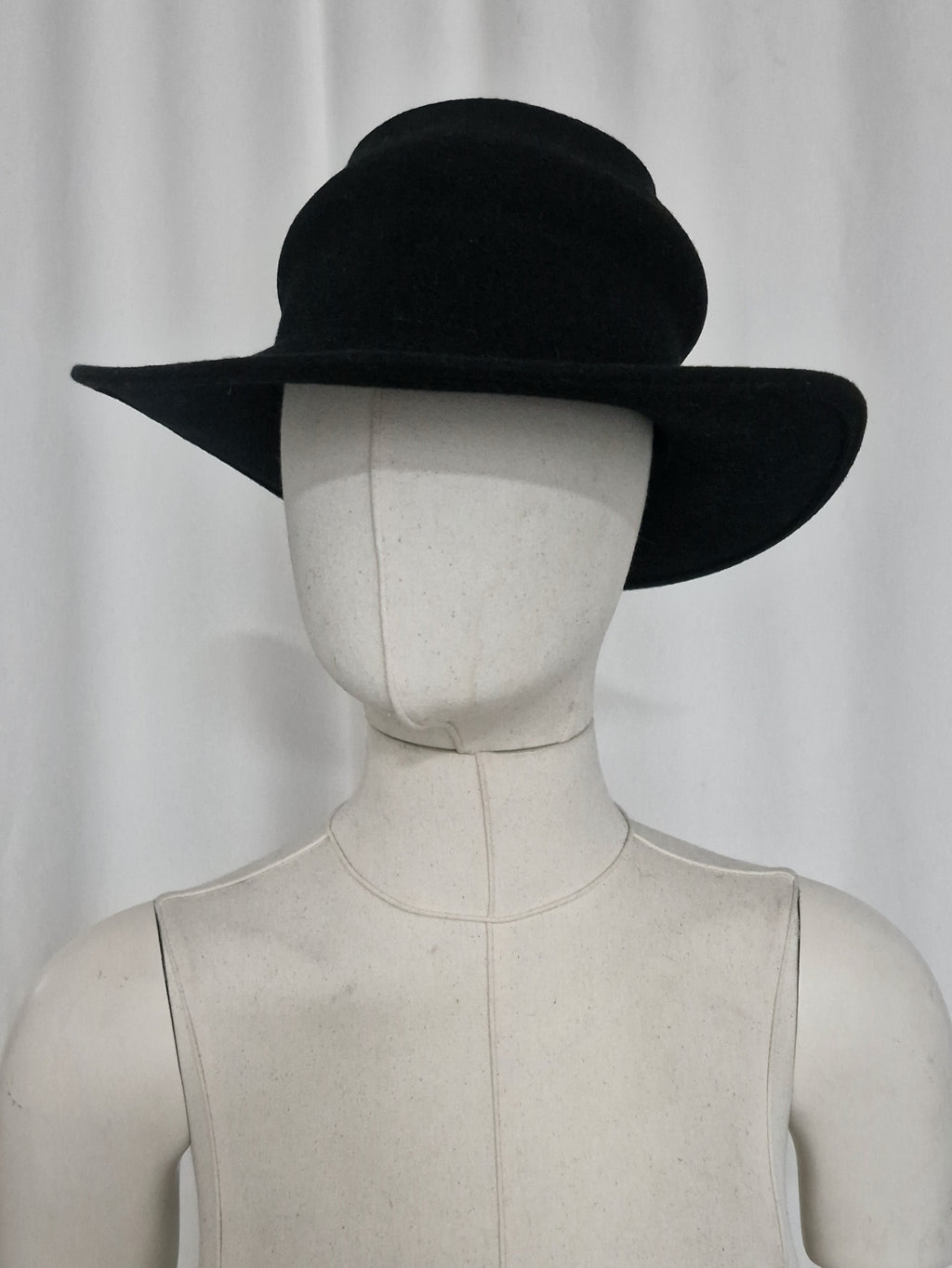 Asymmetric wool felt hat made by combining two of our hat blocks