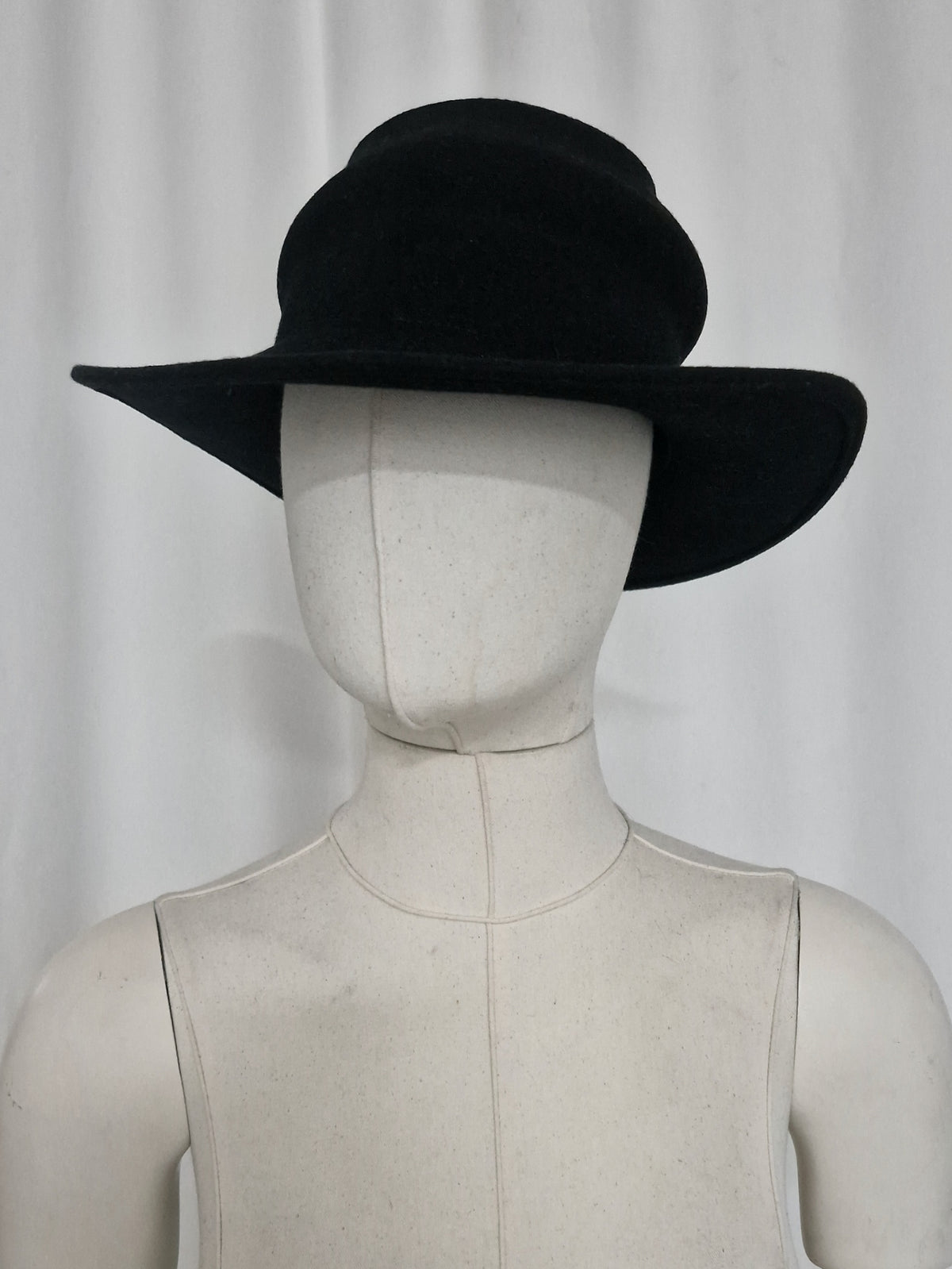 Asymmetric wool felt hat made by combining two of our hat blocks